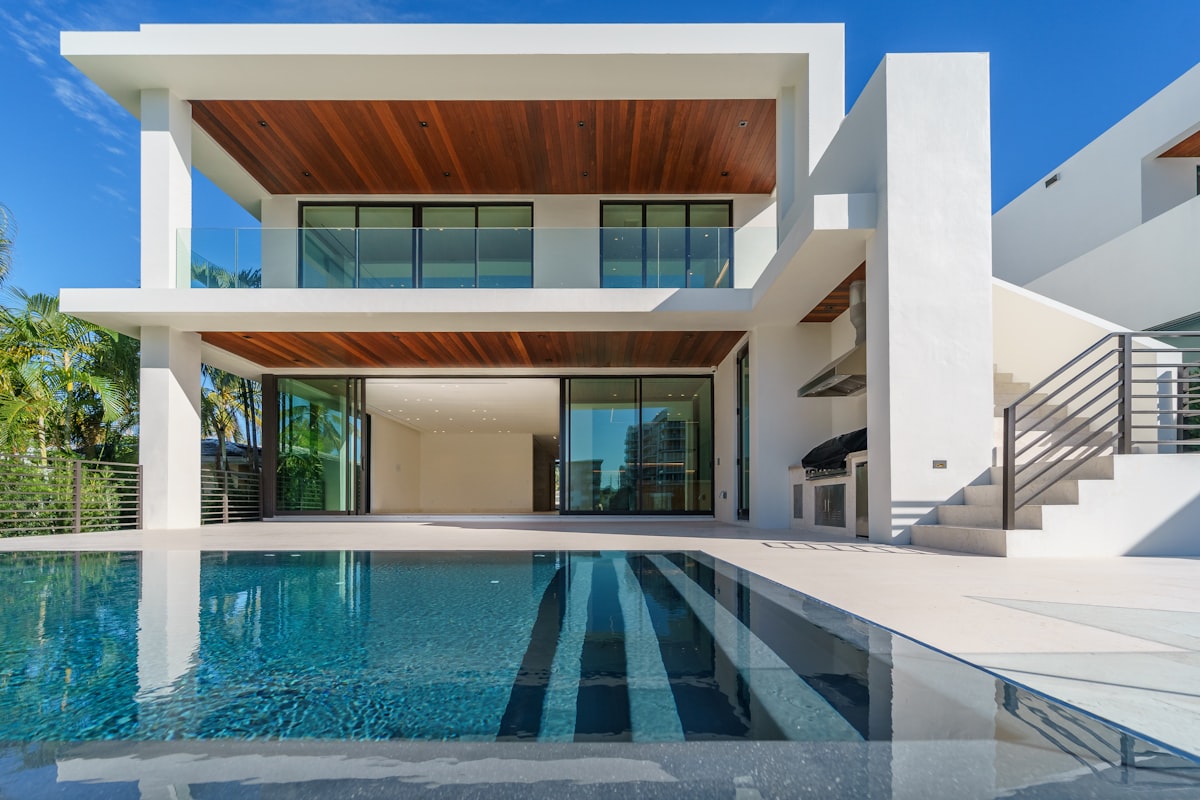 Modern single-family home with wooden façade and garden